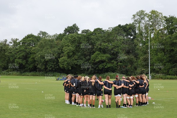 150725 - Wales Women Rugby training - The Wales Women’s squad huddle up during a training session ahead of their two match tour against Australia
