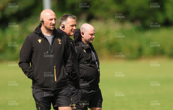 150725 - Wales Women Rugby training - Mike Hill, Wales Women forwards coach, Shaun Connor, Wales Women attack coach and Sean Lynn, Wales Women head coach, during a training session ahead of their two match tour against Australia