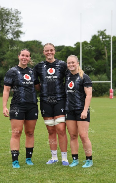 150725 - Wales Women Rugby training - Katherine Baverstock, Tilly Vucaj and Seren Lockwood during a training session ahead of their two match tour against Australia