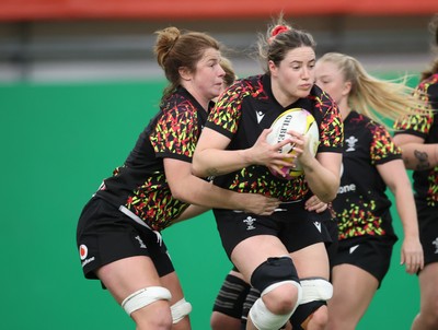 150825 - Wales Women Rugby Training - Gwen Crabb is tackled by Kate Williams during the final training session at their Vale headquarters before heading to Manchester for the start of the Women’s Rugby World Cup