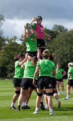 150926 Wales Women Rugby Training Session - Alex Callender wins the ball from Bethan Lewis during a training session ahead of the WXV match against South Africa 