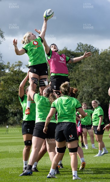 150926 Wales Women Rugby Training Session - Alex Callender wins the ball from Bethan Lewis during a training session ahead of the WXV match against South Africa 