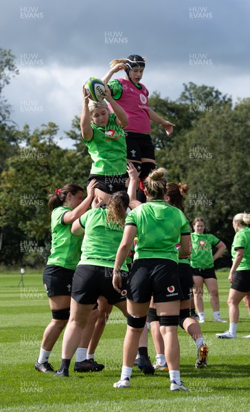 150926 Wales Women Rugby Training Session - Alex Callender wins the ball from Bethan Lewis during a training session ahead of the WXV match against South Africa 