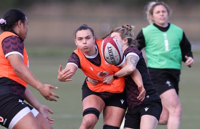 160424 - Wales Women Rugby Training - Bryonie King takes on Keira Bevan during a training session ahead of Wales’ Guinness Women’s 6 Nations match against France