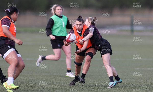 160424 - Wales Women Rugby Training - Bryonie King takes on Keira Bevan during a training session ahead of Wales’ Guinness Women’s 6 Nations match against France