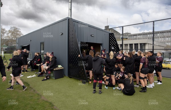 161023 - Wales Women Rugby Training Session - The Wales squad listen to a team briefing during a training session at NZCIS ahead of their first WXV1 match against Canada in Wellington 