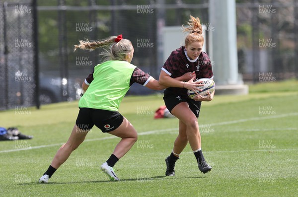 161023 - Wales Women Rugby Training Session - Niamh Terry takes on Hannah Jones during a training session at NZCIS ahead of their first WXV1 match against Canada in Wellington 