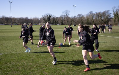 180325 Wales Women Rugby Training -  Wales Women warm up during a Wales training session ahead of the opening Women’s Six Nations match against Scotland