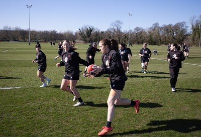 180325 Wales Women Rugby Training -  Wales Women warm up during a Wales training session ahead of the opening Women’s Six Nations match against Scotland