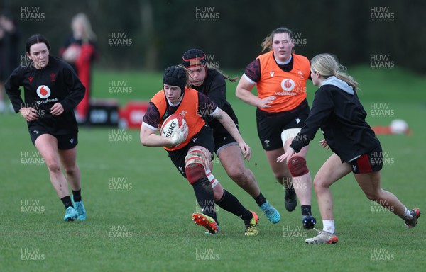 190324 - Wales Women Rugby Training - Bethan Lewis takes on Carys Phillips during training session ahead of the start of the Women’s 6 Nations