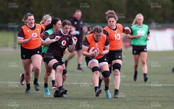 190424 - Wales Women Rugby training session - Carys Phillips charges forward during a training session ahead of Wales’ Guinness 6 Nations match against France