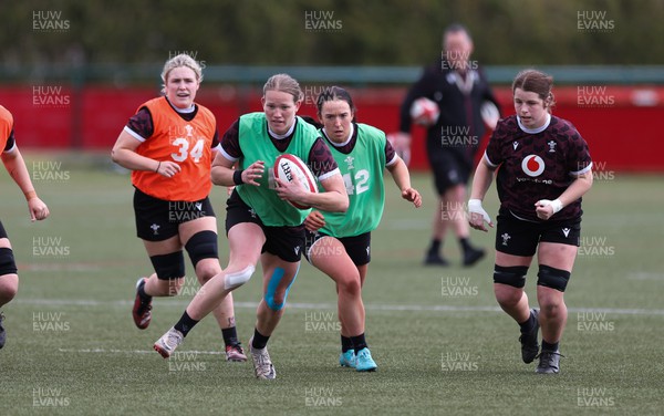 190424 - Wales Women Rugby training session - Carys Cox charges forward during a training session ahead of Wales’ Guinness 6 Nations match against France