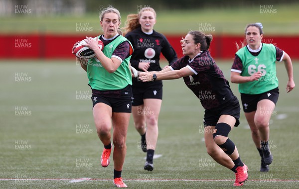 190424 - Wales Women Rugby training session - Hannah Jones takes on Jasmine Joyce during a training session ahead of Wales’ Guinness 6 Nations match against France