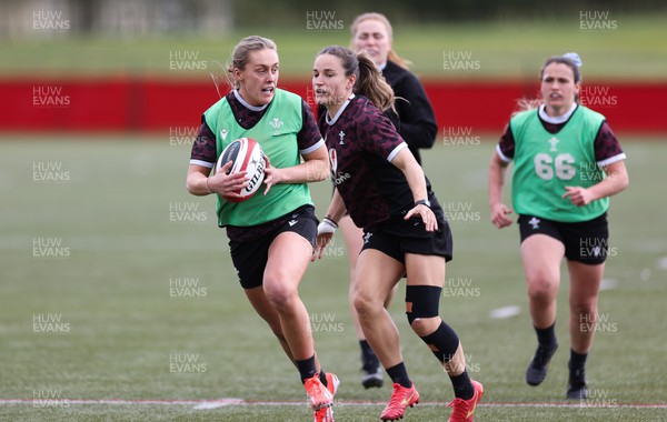 190424 - Wales Women Rugby training session - Hannah Jones takes on Jasmine Joyce during a training session ahead of Wales’ Guinness 6 Nations match against France