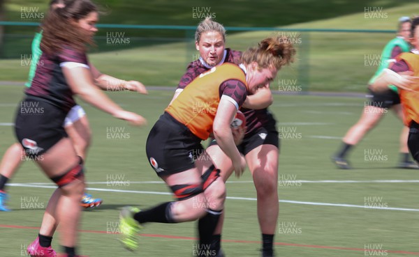 190424 - Wales Women Rugby training session - Abbie Fleming charges forward during a training session ahead of Wales’ Guinness 6 Nations match against France