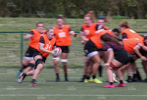 190424 - Wales Women Rugby training session - Alex Callender charges forward during a training session ahead of Wales’ Guinness 6 Nations match against France