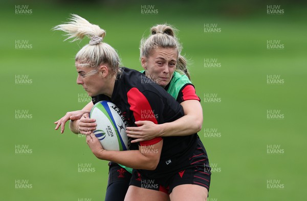 190922 - Wales Women World Cup Squad Training session - Carys Williams-Morris is tackled by Hannah Jones during a training session ahead of Wales’ departure for the Women’s Rugby World Cup