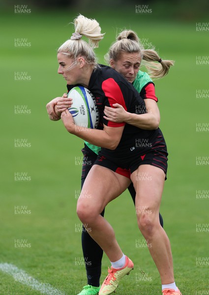 190922 - Wales Women World Cup Squad Training session - Carys Williams-Morris is tackled by Hannah Jones during a training session ahead of Wales’ departure for the Women’s Rugby World Cup