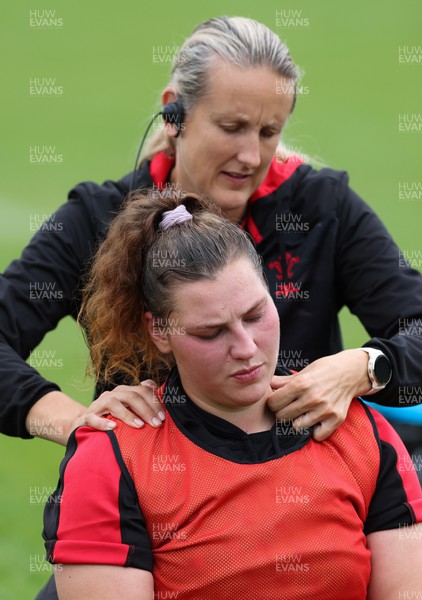 190922 - Wales Women World Cup Squad Training session - Jo Perkins treats Gwenllian Pyrs during a training session ahead of Wales’ departure for the Women’s Rugby World Cup
