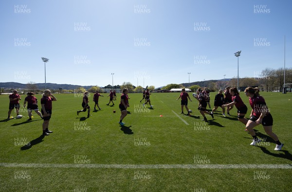 191023 - Wales Women Rugby Training Session - The players warm up during a training session ahead of Wales’ opening match of WXV1 against Canada