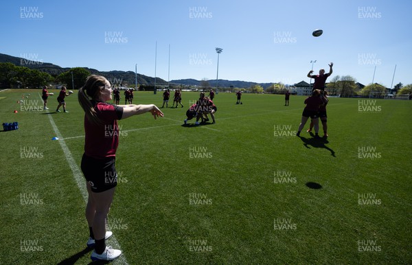 191023 - Wales Women Rugby Training Session - Kat Evans throws in for the line out during a training session ahead of Wales’ opening match of WXV1 against Canada