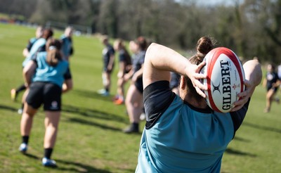 200325  Wales Women Rugby Training Session - Carys Phillips throws in the ball during training session ahead of the opening match of the Women’s 6 Nations against Scotland