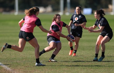 200325  Wales Women Rugby Training Session - Lleucu George takes on Robyn Wilkins during training session ahead of the opening match of the Women’s 6 Nations against Scotland