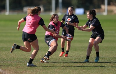 200325  Wales Women Rugby Training Session - Lleucu George takes on Robyn Wilkins during training session ahead of the opening match of the Women’s 6 Nations against Scotland