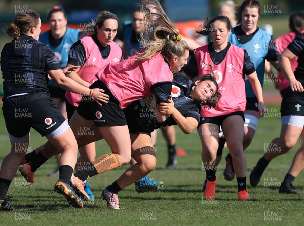 200325  Wales Women Rugby Training Session - Hannah Jones takes on Gwennan Hopkins during training session ahead of the opening match of the Women’s 6 Nations against Scotland