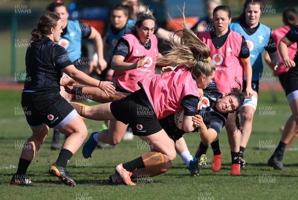 200325  Wales Women Rugby Training Session - Hannah Jones takes on Gwennan Hopkins during training session ahead of the opening match of the Women’s 6 Nations against Scotland