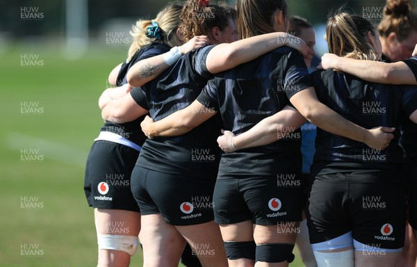 200325  Wales Women Rugby Training Session - The Wales squad huddle up during training session ahead of the opening match of the Women’s 6 Nations against Scotland