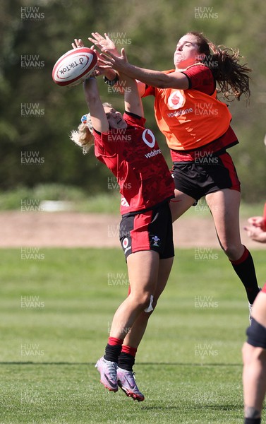 200423 - Wales Women Rugby Training Session - Lowri Norkett and Lisa Neumann compete for the ball during a training session ahead of the TicTok Women’s 6 Nations matches against France and Italy