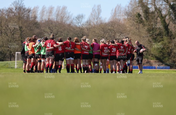 200423 - Wales Women Rugby Training Session - The Wales team huddle together during a training session ahead of the TicTok Women’s 6 Nations matches against France and Italy