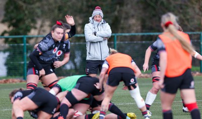 210323 - Wales Women Rugby Training Session - Coach Mike Hill looks on during a training session ahead of Wales’ opening Women’s 6 Nations match against Ireland