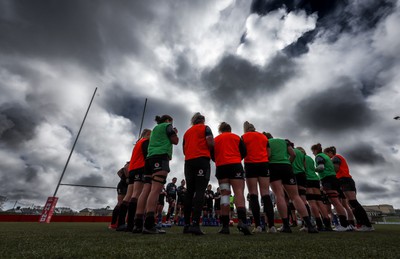 210323 - Wales Women Rugby Training Session - The Wales Women squad huddle together during a training session ahead of Wales’ opening Women’s 6 Nations match against Ireland