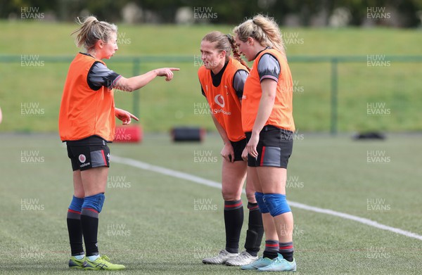 210323 - Wales Women Rugby Training Session - Elinor Snowsill, Lisa Neumann and Courtney Keight during a training session ahead of Wales’ opening Women’s 6 Nations match against Ireland