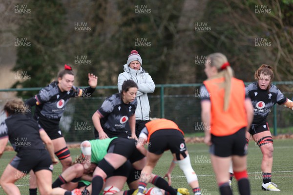 210323 - Wales Women Rugby Training Session - Coach Mike Hill looks on during a training session ahead of Wales’ opening Women’s 6 Nations match against Ireland