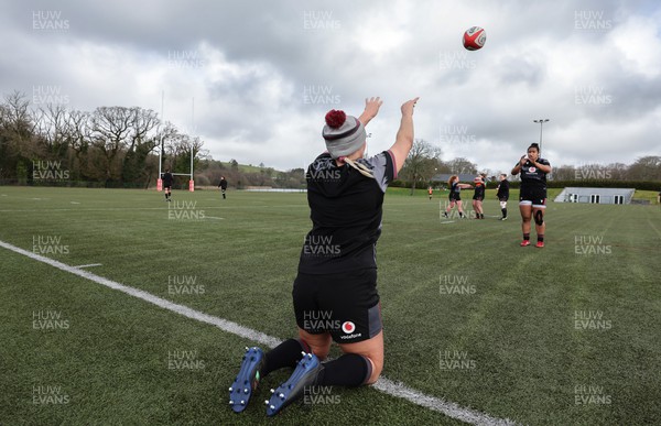 210323 - Wales Women Rugby Training Session - Kelsey Jones works with Sisilia Tuipulotu during a training session ahead of Wales’ opening Women’s 6 Nations match against Ireland