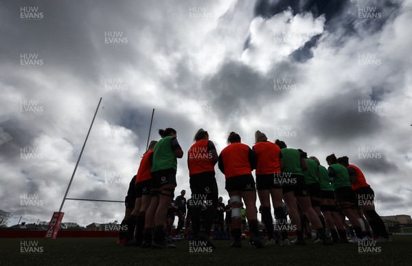 210323 - Wales Women Rugby Training Session - The Wales Women squad huddle together during a training session ahead of Wales’ opening Women’s 6 Nations match against Ireland