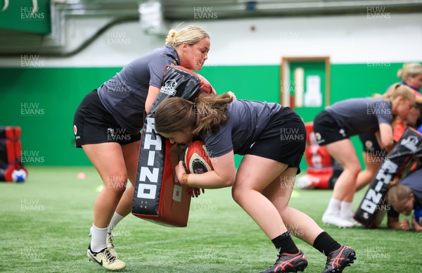 220425 - Wales Women Rugby Training - Kelsey Jones of Wales and Maisie Davies of Wales during training session ahead of Wales’ final Guinness Women’s Six Nations match against Italy
