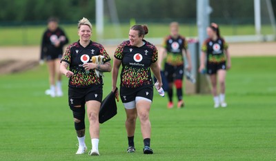 210426 - Wales Women’s Rugby Training - Donna Rose and Carys Phillips during a rugby training session ahead of the Women’s 6 Nation’s match against England