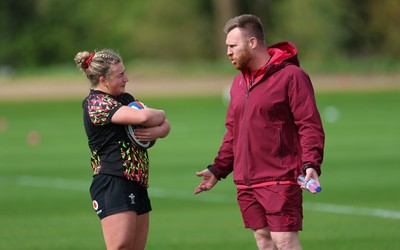 210426 - Wales Women’s Rugby Training - Molly Reardon with Tyrone Holmes, Wales Women defence coach, during a rugby training session ahead of the Women’s 6 Nation’s match against England