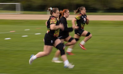210426 - Wales Women’s Rugby Training - Jenni Scoble, Georgia Evans and Natalia John during a rugby training session ahead of the Women’s 6 Nation’s match against England