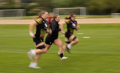 210426 - Wales Women’s Rugby Training - Alaw Pyrs, Katherine Baverstock and Branwen Metcalfe during a rugby training session ahead of the Women’s 6 Nation’s match against England