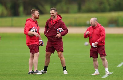 210426 - Wales Women’s Rugby Training - Left to right, Tyrone Holmes, Wales Women defence coach, Ashley Beck, Wales Women interim attack coach and Sean Lynn, Wales Women head coach during a training session ahead of the Women’s 6 Nation’s match against England