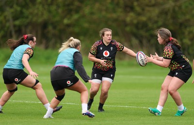 210426 - Wales Women’s Rugby Training - Carys Phillips and Maisie Davies during a training session ahead of the Women’s 6 Nation’s match against England
