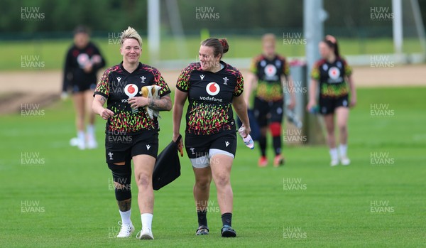 210426 - Wales Women’s Rugby Training - Donna Rose and Carys Phillips during a rugby training session ahead of the Women’s 6 Nation’s match against England