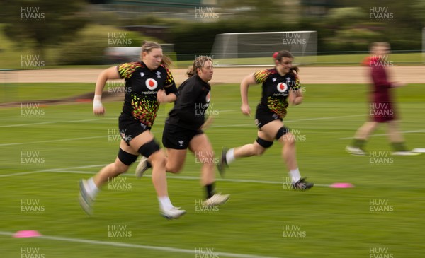 210426 - Wales Women’s Rugby Training - Alaw Pyrs, Katherine Baverstock and Branwen Metcalfe during a rugby training session ahead of the Women’s 6 Nation’s match against England