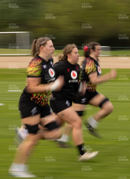 210426 - Wales Women’s Rugby Training - Alaw Pyrs, Katherine Baverstock and Branwen Metcalfe during a rugby training session ahead of the Women’s 6 Nation’s match against England