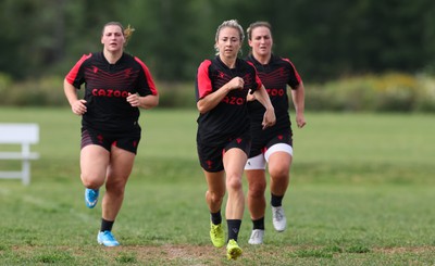 220822 - Wales Women Rugby in Canada - Gwenllian Pyrs, Elinor Snowsill and Siwan Lillicrap during the first Wales Women training session at their training base just outside Halifax